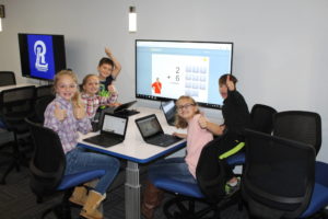 Students learning new technologies at the Innovation Lab.